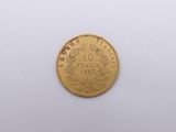 an image of a gold coin on a white surface