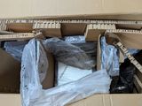 a cardboard box that has a bunch of items inside of it
