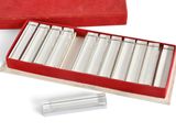a red box that has a set of silver bars in it