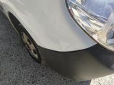 a close up of a car ' s front bumper