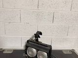 a black table with two lights on top of it