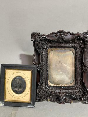 a picture of a picture of a man and a picture of a woman in a picture frame