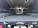 a picture of a flat bed truck with a license plate
