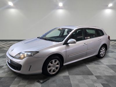 a picture of a silver car parked in a garage