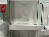 a display case with many items in it in a store