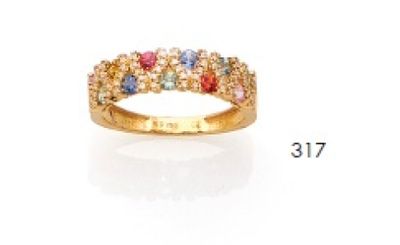 une photo d'une bague en or jaune sertie de pierres multicolores