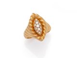 a gold and diamond ring, by van cleef
