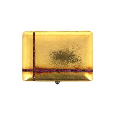 une image représentant un porte-monnaie doré orné d'une bande rouge