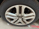 a close up of a tire on a car