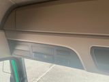 a view of a dashboard of a car from inside the vehicle