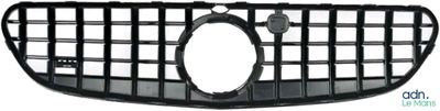 a close up of a black grille on a white background