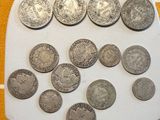 a lot of coins sitting on a scale on a table