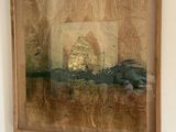 a picture of a painting hanging on the wall