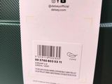 a tag on a piece of luggage hanging from the handle of it
