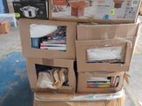 many boxes stacked on top of each other on the floor