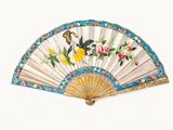 a hand painted fan with flowers and birds on it
