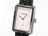a watch that is sitting on a black strap