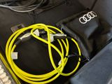 a suitcase that has a bunch of cables in it