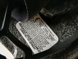 a close up of a helmet with a tag attached to it