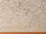 an old map of the country of england with a wooden frame