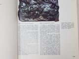 an open book with a picture of a group of people on it