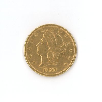 a gold coin with a profile of a woman on it