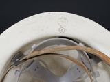 a close up of a toilet bowl with the lid down