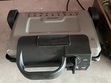 an image of a toaster and toaster on a counter
