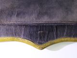 an image of a close up of a leather case on a table