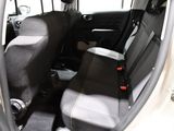 two seats in the back of a small car