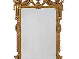 an image of a gold framed mirror on a white background