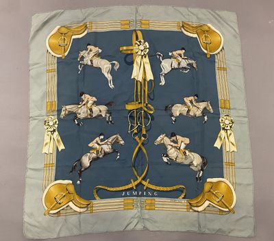 an image of a scarf with horses and jockeys on it