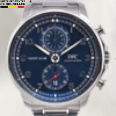 a close up of a wrist watch with a blue face