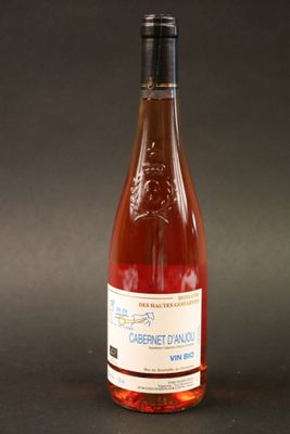 a bottle of wine that is sitting on a table
