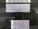 a picture of a display case with three different designs on it