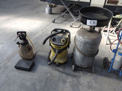 a lot of gas cans that are sitting on the floor