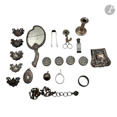 an image of a collection of antique silver jewelry on a white background