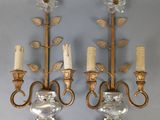 pair of brass and glass wall sconces with flowers and leaves