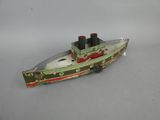 a toy boat that is sitting on a table