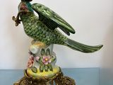 a bird that is sitting on top of a table