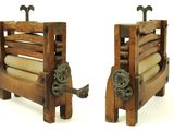 two old wooden machines that are next to each other