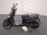 a scooter that is parked on the floor