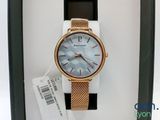 a close up of a watch on display in a box