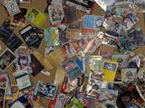 a large pile of cards on the floor of a room