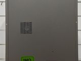 a metal cabinet that has a green label on it