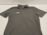 a grey shirt with a white logo on the chest