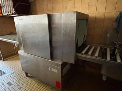a large machine that is sitting in a kitchen