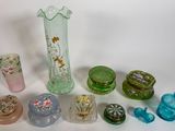 a lot of glass items that are sitting on a table