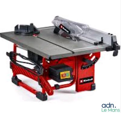 a red table with a saw on top of it on a white background