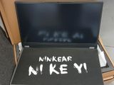 a box with a laptop inside of it with the words nikear nikey written on it